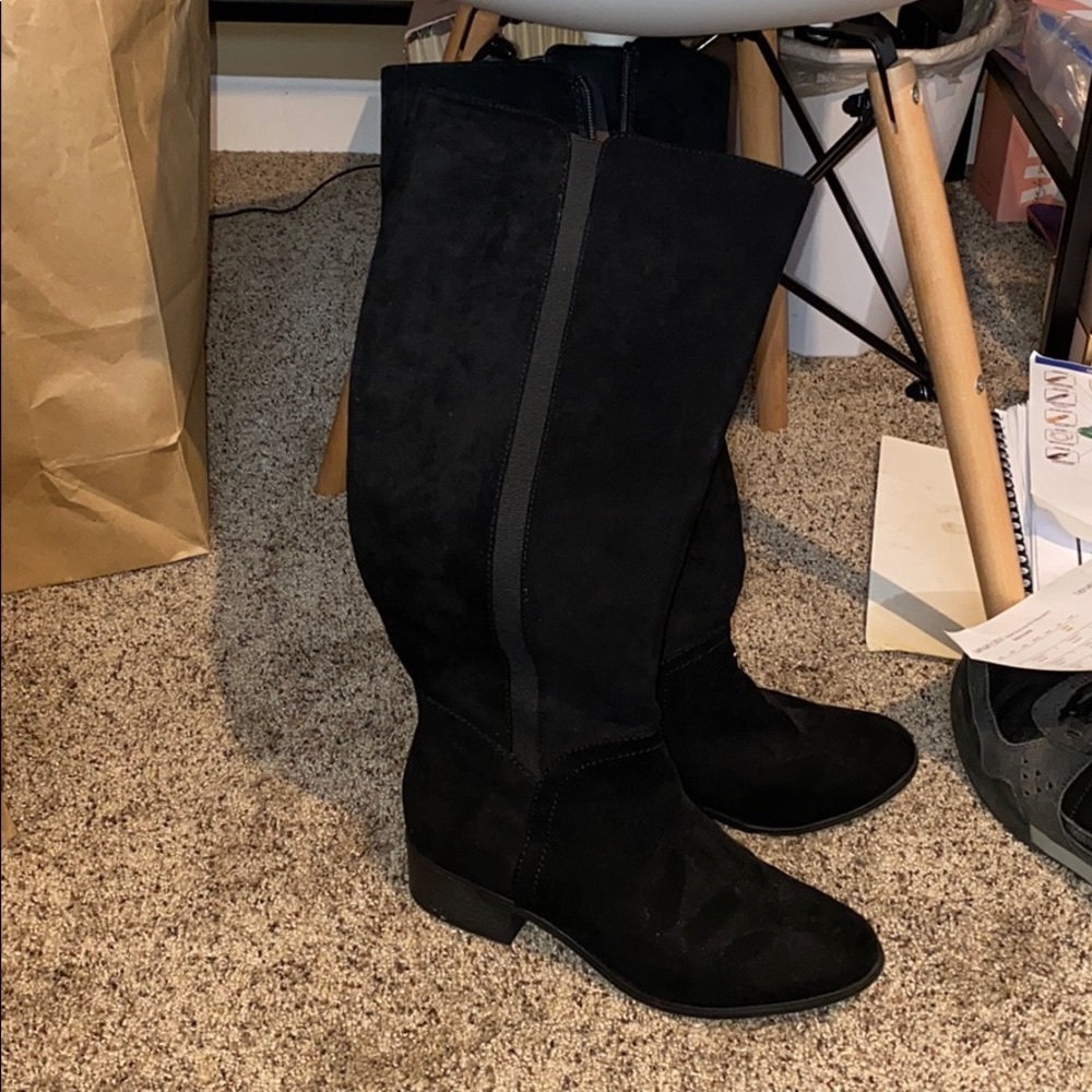 Tall black suede boots